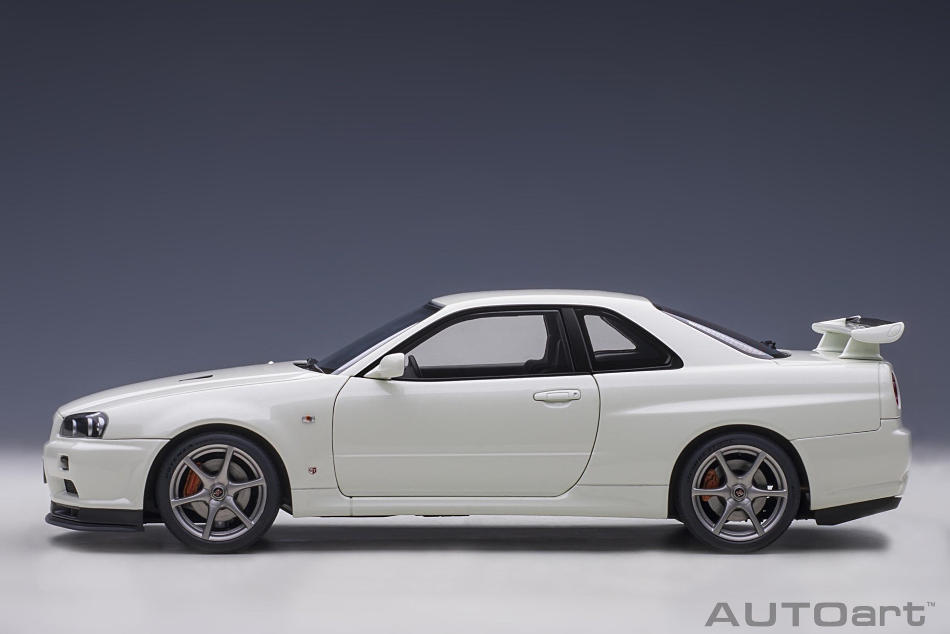 Nissan Skyline GT-R R34 V-spec II White Pearl 1:18 - 44092