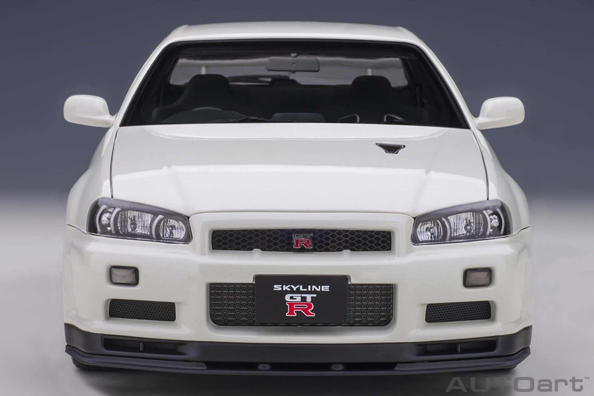 Nissan Skyline GT-R R34 V-spec II White Pearl 1:18 - 44095