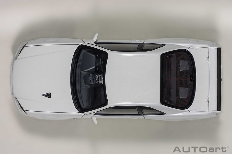 Nissan Skyline GT-R R34 V-spec II White Pearl 1:18 - 44097
