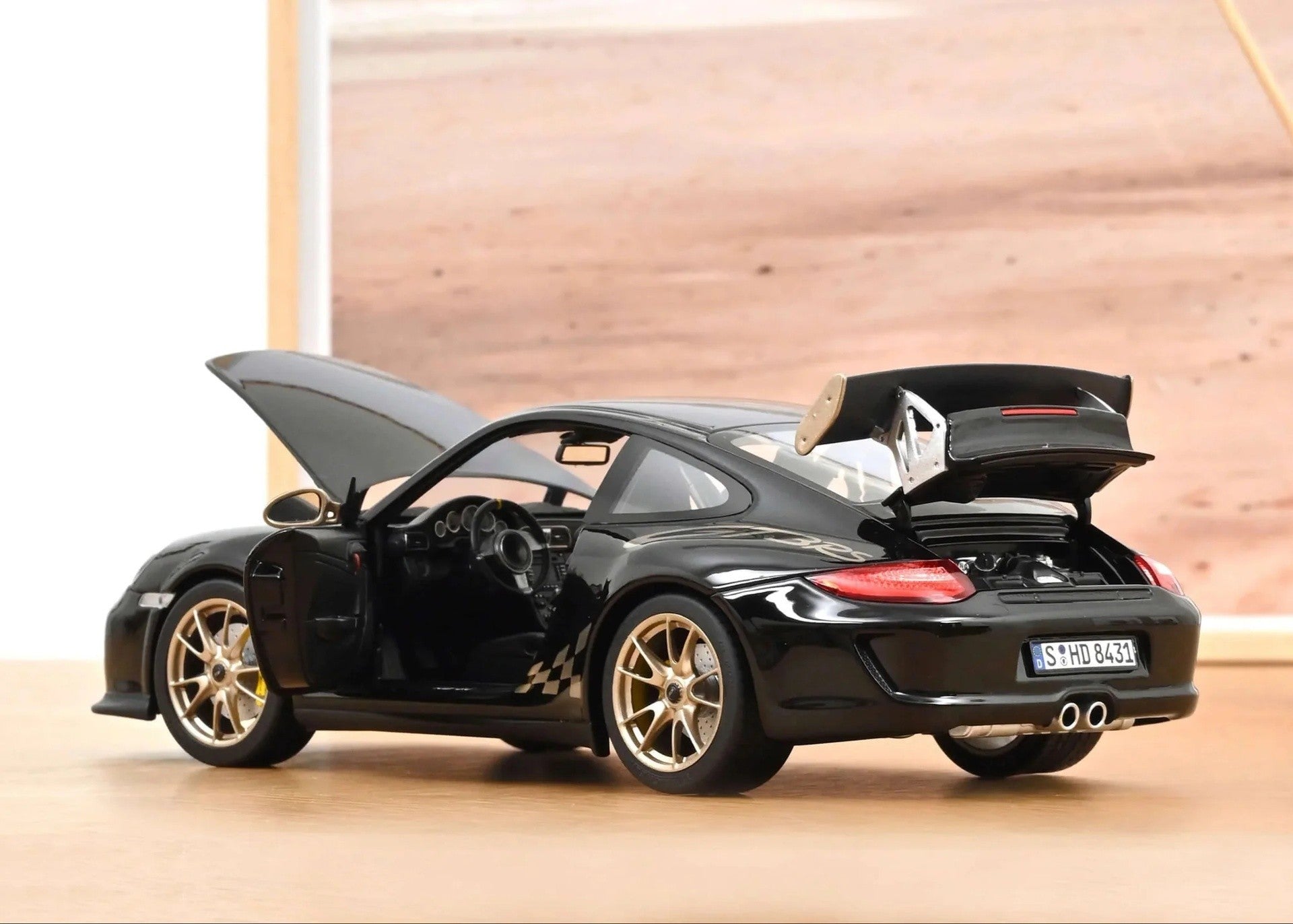 Porsche 911 (997.2) GT3 RS 2009 Black - Gold 1:18 - 89180